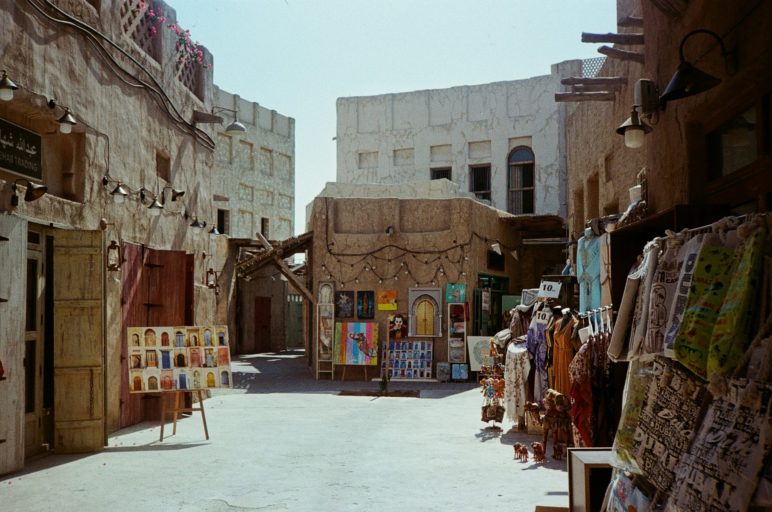 Historic souk alleys and wind towers in Old Dubai